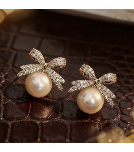 XE233 - Pearl Bowtie Stud Earrings
