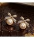 XE233 - Pearl Bowtie Stud Earrings