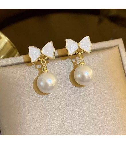 XE241 - Bowtie Pearl Drop Earrings