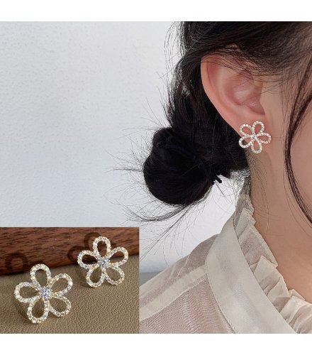 XE347 - Korean Hollow Flower Earrings 